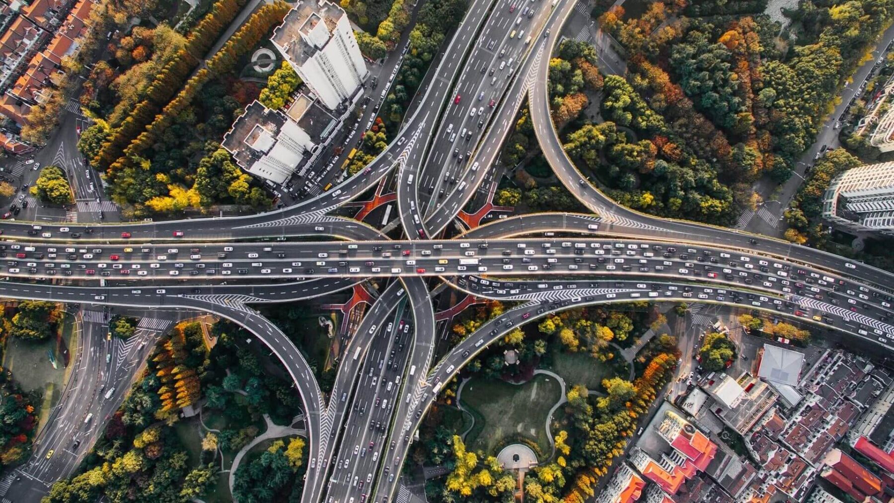 A bird 's eye view of an intersection with multiple lanes.